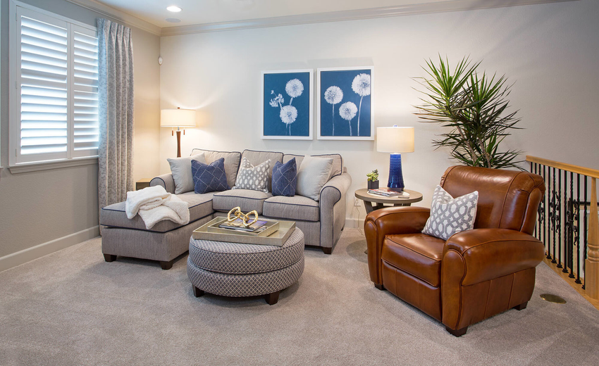 KTJ-Design-Co.+Stockton-California+family-room-design+leather-chair+greenery.png