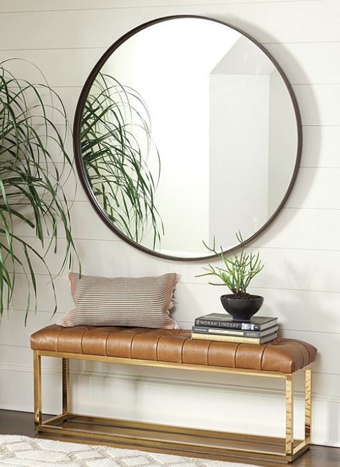 Thomas Round MirrorWith its clean, unadorned lines, the Thomas Round Mirror epitomizes modern simplicity. The flat metal frame creates a light-filled banded border with just enough depth for contrast with the clear mirror.Dimensions: 33" Mirror: 33"…