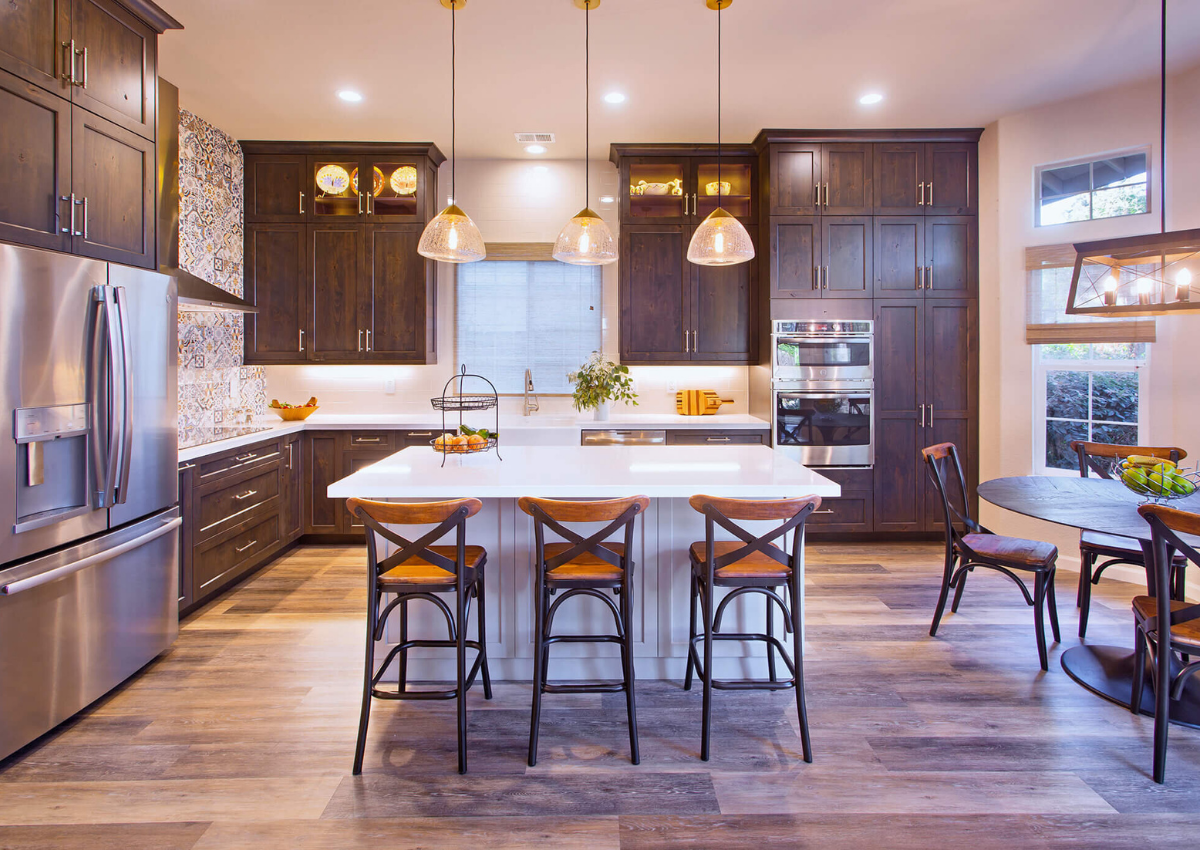 ktj-design-co-stockton-ca-pandemic-home-industry-kitchen-with-dark-cabinetry-and-statement-lighting.png