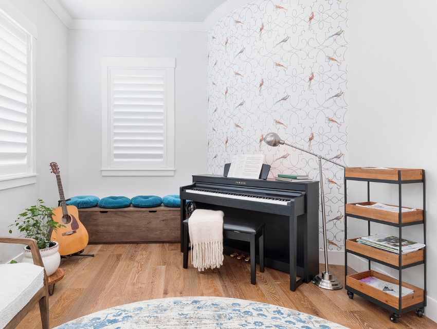 ktj-design-co_stockton-califonria_how-we-created-a-magnificent-music-room-playroom-loft_rounded-wall-with-piano-and-wallpaper-in-music-room.png
