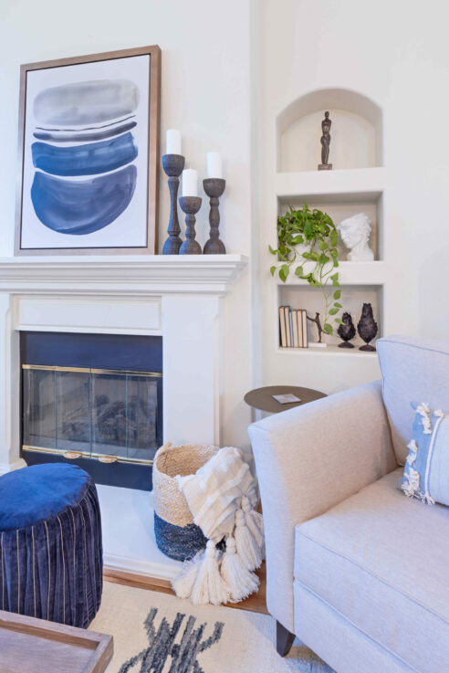 ktj-design-co-stockton-ca-95219-living-room-white-chair-blue-artwork