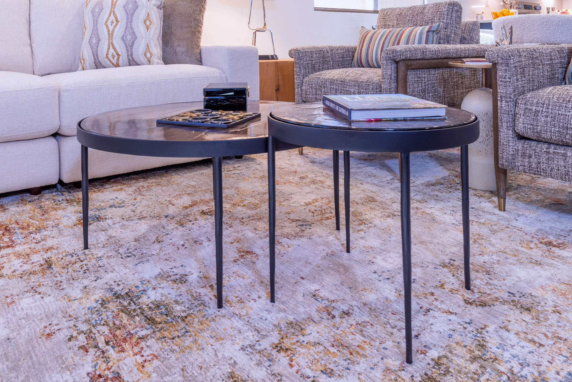 living-room-great-room-amber-glass-nesting-tables-pet-friendly-area-rug-95212-interior-design_ho9a7857