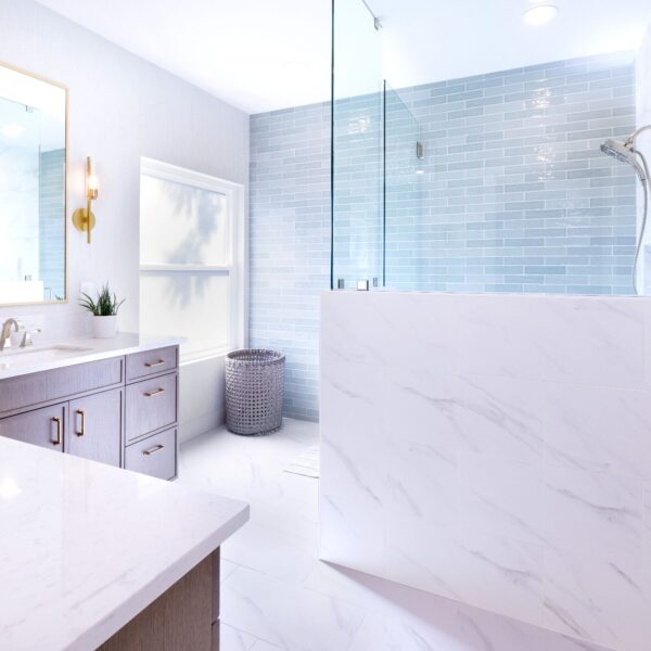 How Smart Space Planning Transformed Three Dated Bathrooms