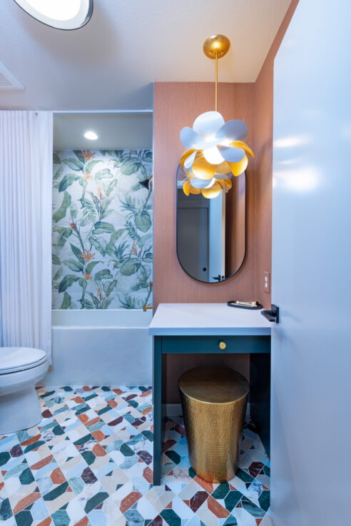 ktj-design-co-award-winning-forest-inspired-bathroom-remodel-with-green-vanity-terracotta-walls-and-botanical-tile-mural-over-tub-95236-ho9a0156-2