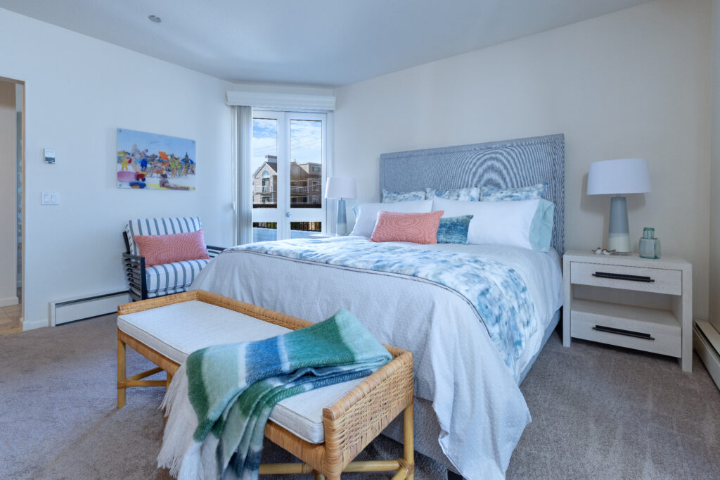Santa Cruz California Coastal Primary Bedroom With Upholstered Bed, Woven Bench, And Soft Ocean Inspired Palette