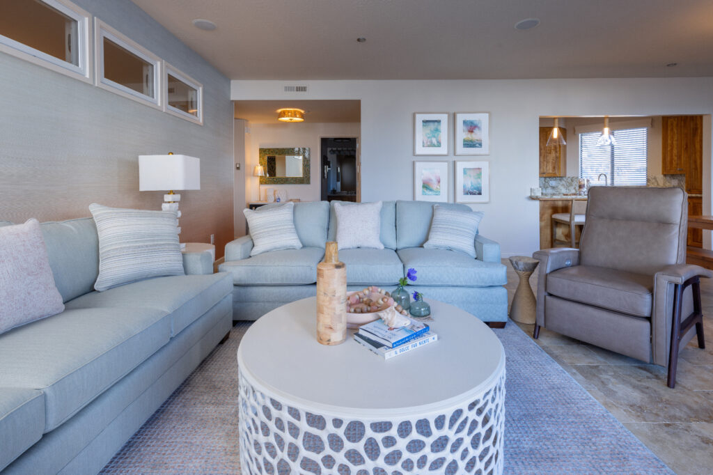 Santa Cruz Coastal Condo Living Room With Light Blue Sofas Recliner And Open Concept Layout