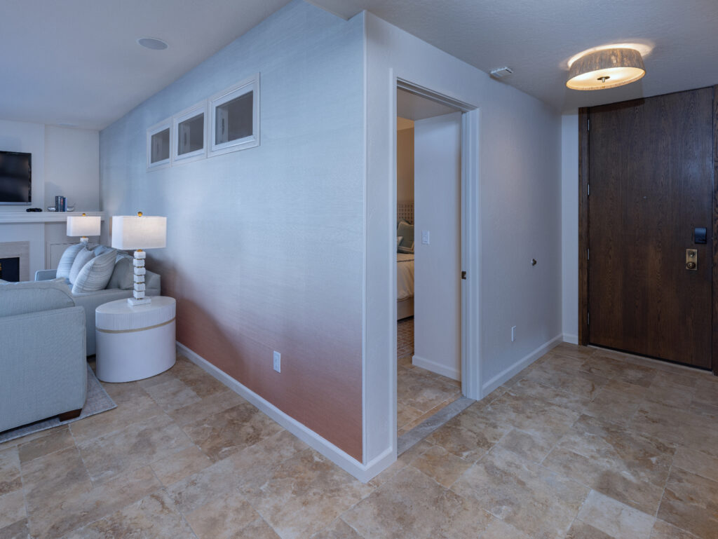 Santa Cruz Condo Entry Hallway With Grasscloth Wallcovering And Transom Windows For Natural Light Flow