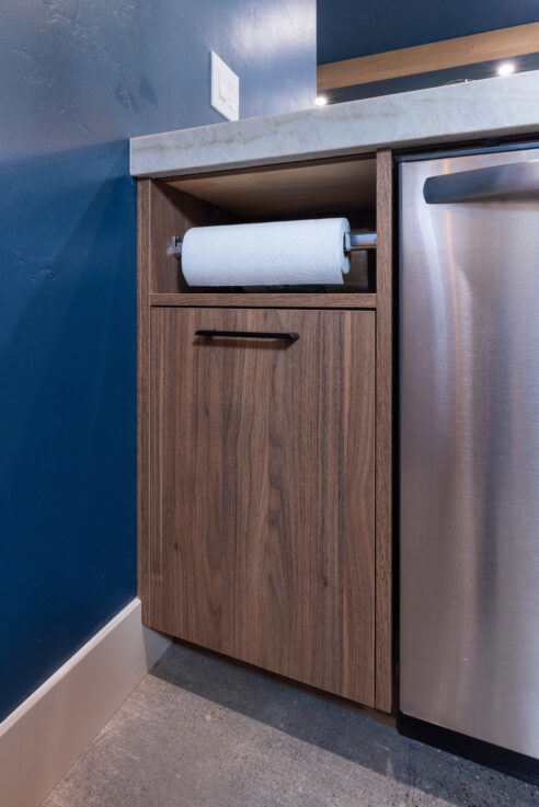 morada-ktj-design-co-gameroom-bar-kitchen-built-in-paper-towel-holder-wynnbrooke-cabinetry-polished-concrete-jenco_ho9a1563