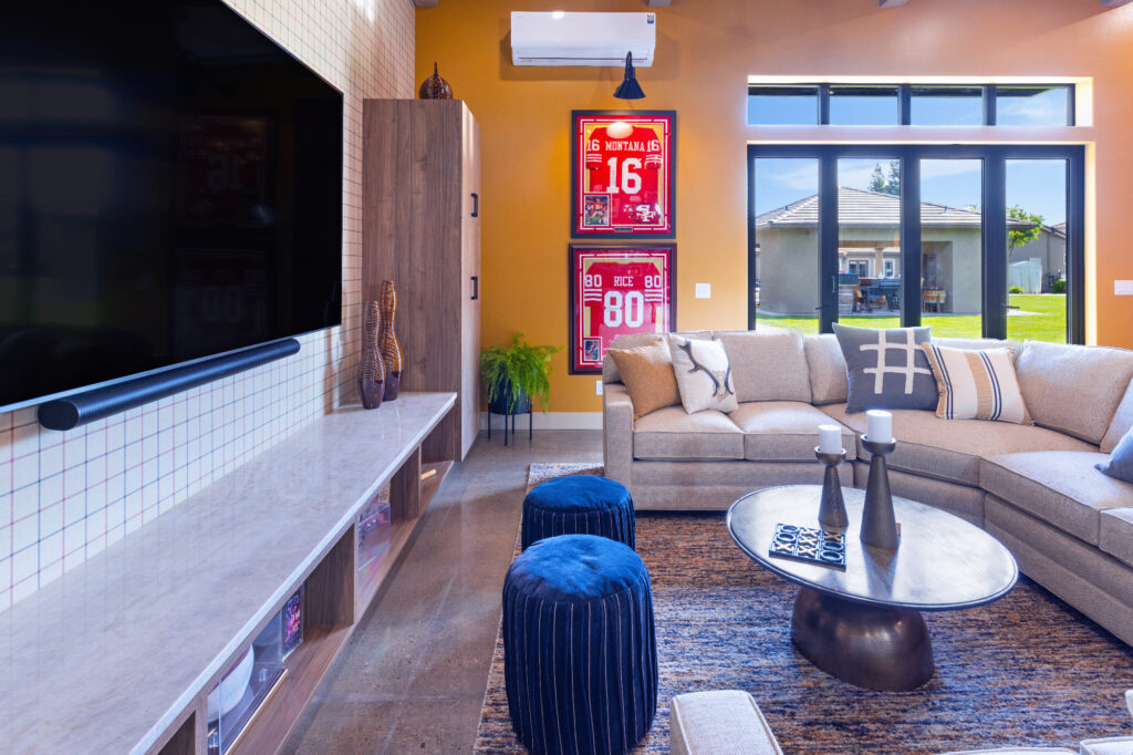 Morada Ktj Design Co Gameroom Gold Wall Sectional Folding Door 49ers Polished Concrete Floors Ho9a1355