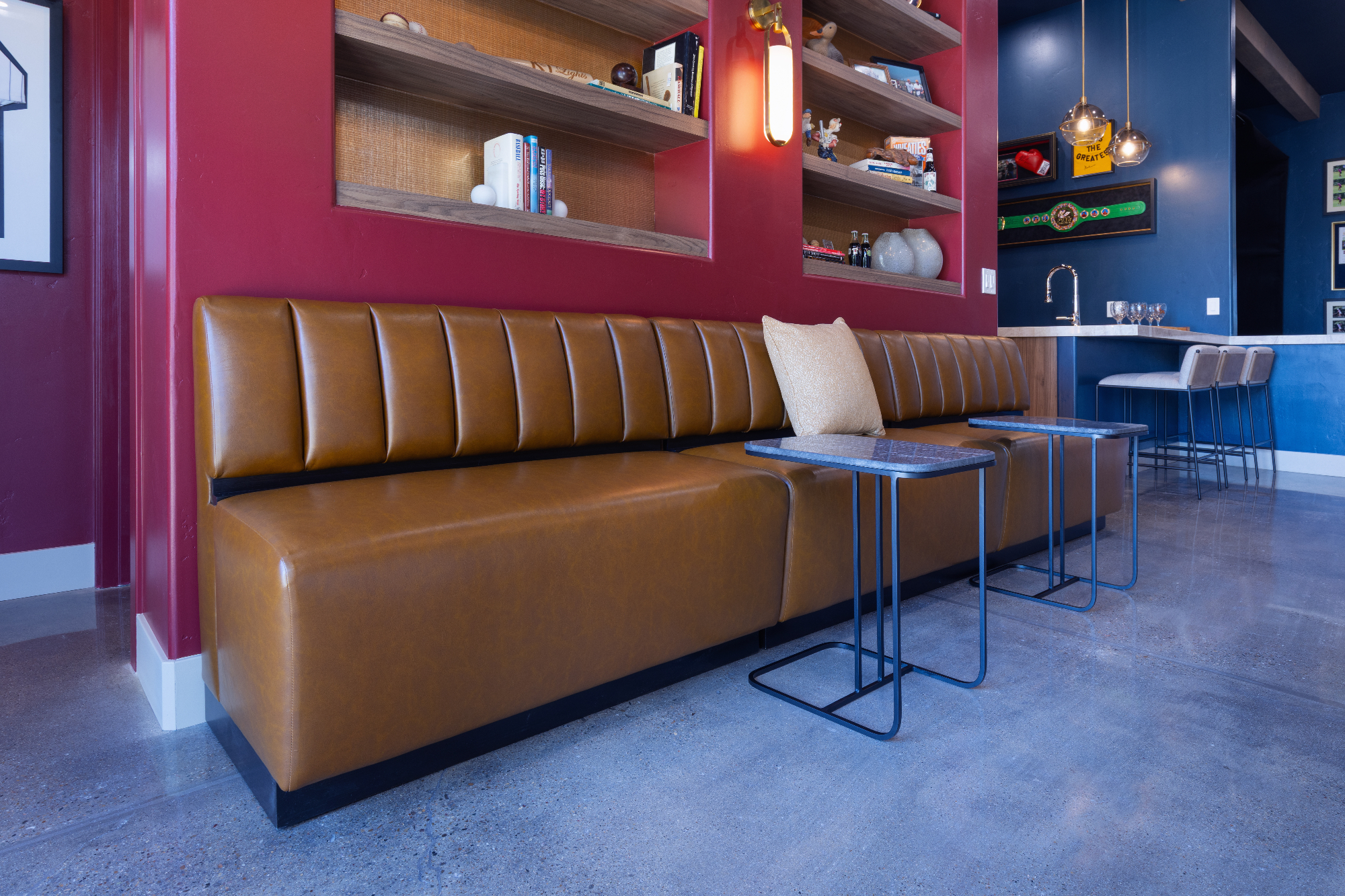morada-ktj-design-co-gameroom-polished-concrete-floors-leather-bench-seating-tray-tables-49er-red-sports-bar-gold-wallpaper_ho9a1632