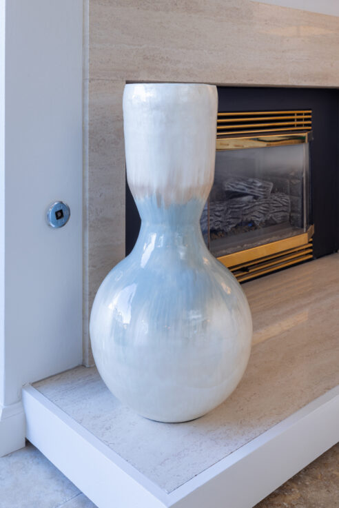 ktj-design-co-santa-cruz-beach-condo-living-room-mirage-vase-blue-green-orange_ho9a6531