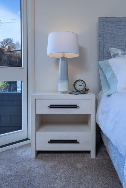ktj-design-co-santa-cruz-beach-condo-tide-line-bedroom-nightstand-blue-glass-lamp_ho9a6393