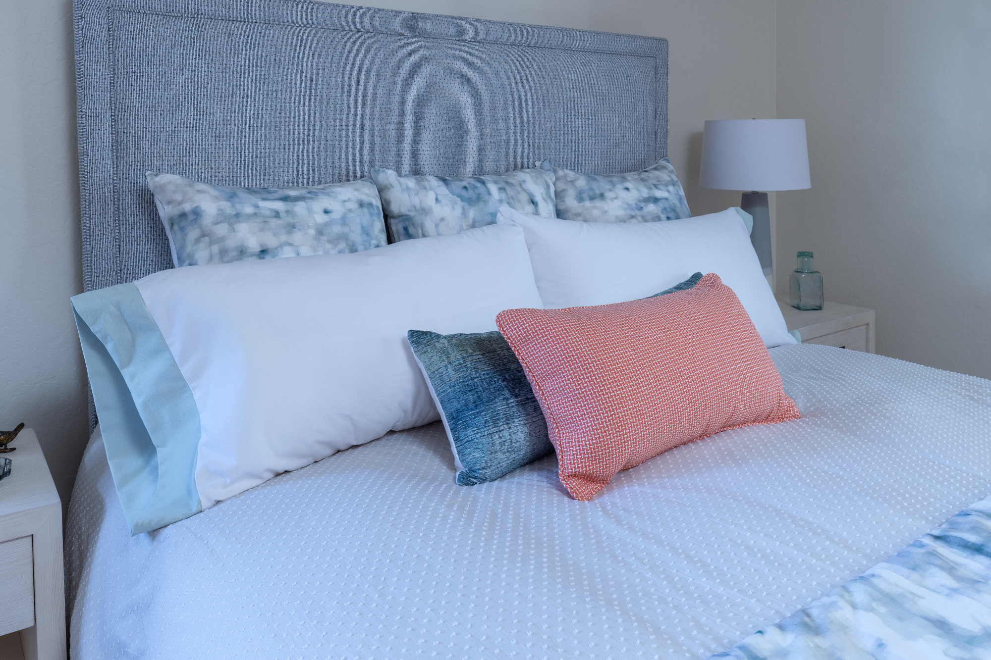 ktj-design-co-santa-cruz-beach-condo-tide-line-bedroom-upholstered-bed-blue-coral-bedding_ho9a6387