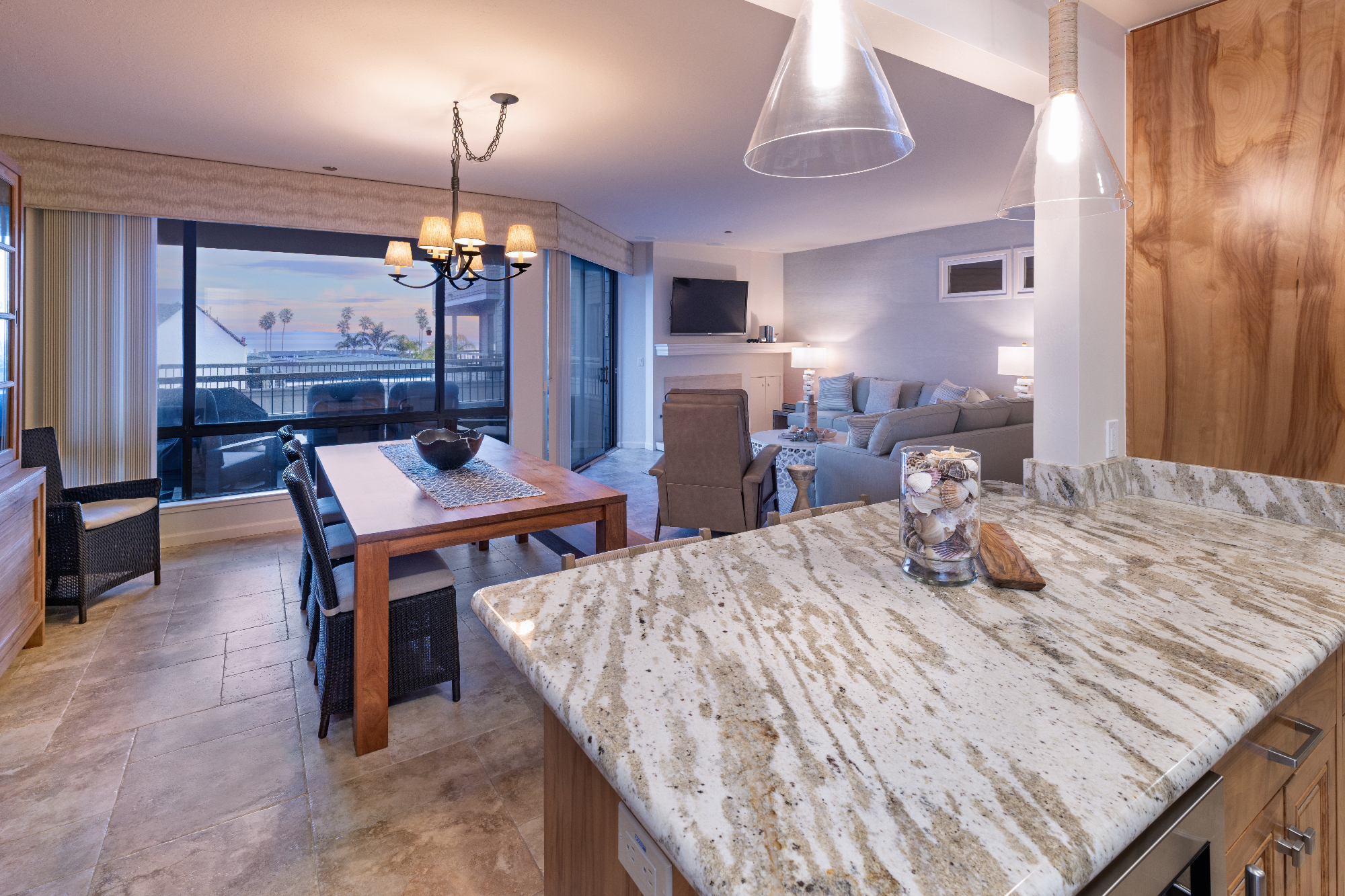 ktj-design-co-santa-cruz-beach-condo-tide-line-kitchen-dining-living-room-coastal-glass-shade-pendant-woven-accents_ho9a6741