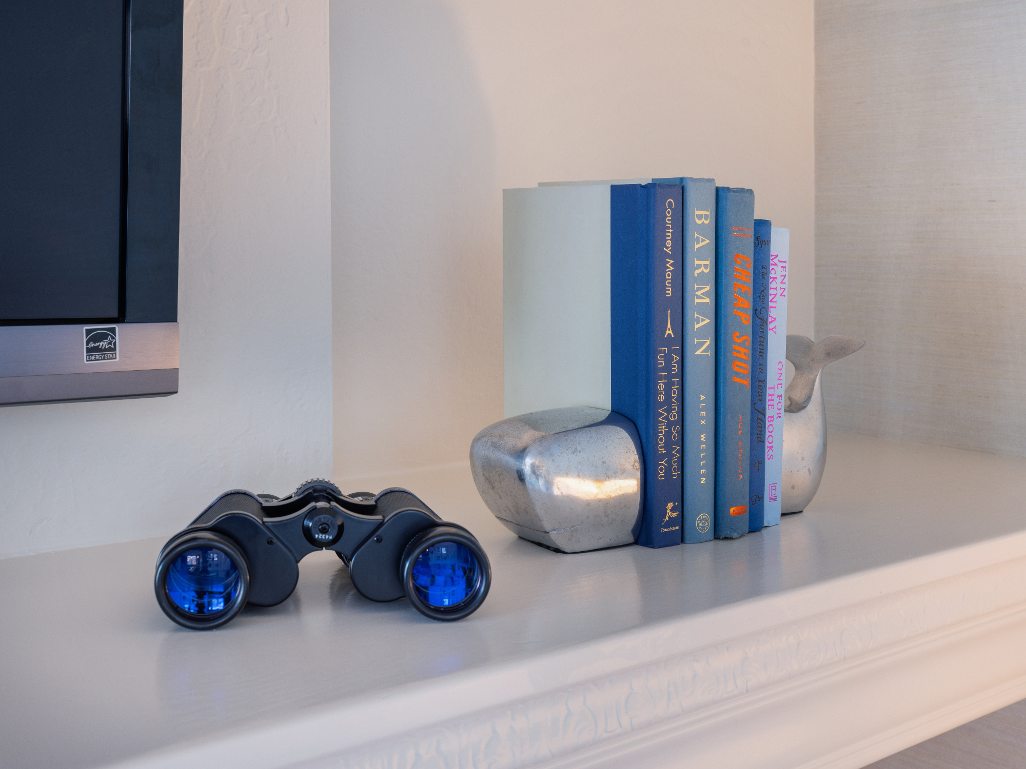ktj-design-co-santa-cruz-beach-condo-tide-line-living-room-decor-whale-bookend-binoculars_ho9a6527