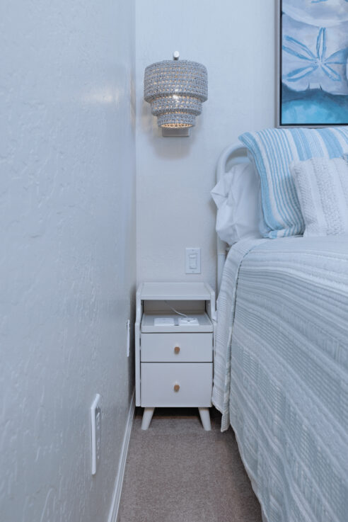 ktj-design-co-santa-cruz-guest-bedroom-wall-sconce-woven-sconce-weathered-gray-beach-condo_ho9a6309